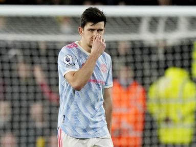 Harry Maguire - Harapan besar menyertai kedatangan pemain asal Inggris ini ketika dibeli MU dengan status bek termahal di dunia. Harga 78,3 juta Pounds nampaknya terlalu mahal untuk bek yang tampil tidak konsisten dan sering membuat blunder. (AP/Frank Augstein)
