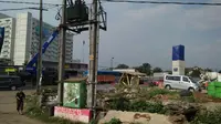  Saluran Tegangan Tinggi (Sutet) milik PLN menghambat pekerjaan pembangunan tol Bogor Ring Road sesi 2B sepanjang 2,65 km. (Liputan6.com/Achmad Sudarno)