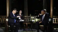 Presiden Obama dan Presiden Xi Jinping minum teh bersama di sebuah paviliun di Hangzhou (AFP)