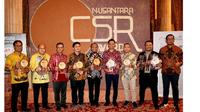 Direktur Utama PT PLN (Persero) Darmawan Prasodjo dinobatkan sebagai Pemimpin Transformasi Bisnis Berkelanjutan dalam ajang Nusantara Corporate Social Responsibility (CSR) Awards 2024 (dok: Humas)