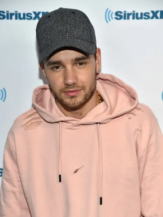 Liam memang kerap memuji kepiawaian Cheryl dalam mengurus buah hatinya. Namun bukan berarti ia akan segera mempersunting wanita itu menjadi istrinya, meskipun keduanya berencana menambah momongan. (AFP/Bintang.com)