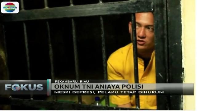 Serda Wira Sinaga kini mendekam dalam ruang tahanan Detasemen Polisi Militer Pekanbaru, Riau.