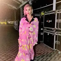 Agnez Mo dalam outfit cerah (Instagram/agnezmo)