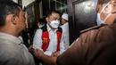 Terdakwa kasus obstruction of justice atau upaya untuk menghalang-halangi suatu proses hukum pada kasus pembunuhan Brigadir Nofriansyah Yosua Hutabarat atau Brigadir J, Arif Rahman Arifin bersiap untuk menjalani sidang lanjutan dengan agenda pembacaan tuntutan oleh Jaksa Penuntut Umum (JPU) di Pengadilan Negeri (PN) Jakarta Selatan, Jumat (27/1/2023). Mantan Wakaden B Biropaminal Divpropam Polri tersebut dituntut 1 tahun penjara dan denda Rp 10 juta subsider 3 bulan kurungan. (Liputan6.com/Johan Tallo)