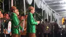 Presiden Jokowi memberikan sambutan pada acara serah terima Paningset dan Midodareni pernikahan Kahiyang Ayu dan Bobby Nasution di kediamannya di Surakarta, Selasa (7/11). (Liputan6.com/Angga Yuniar)