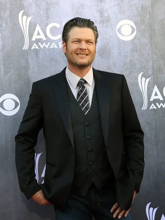 Blake Shelton menjalin hubungan dengan Gwen Stefani pasca perceraian Gwen dengan Gavin Rossdale. Keduanya kini semakin menunjukkan kebersamaan mereka dan tidak menutup-nutupinya. (Bintang/EPA)