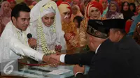 Pernikahan Roby Geisha dan Cinta Ratu Nansya. [Foto: Faisal R. Syam/Liputan6.com]