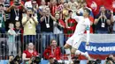 Striker Portugal, Cristiano Ronaldo, melakukan selebrasi usai mencetak gol ke gawang Maroko pada laga Piala Dunia di Stadion Luzhniki, Rabu (20/6/2018). Ronaldo menjadi pencetak gol internasional terbanyak di Eropa dengan 85 gol. (AP/Antonio Calanni)