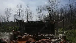 Sebuah rumah hancur akibat luncuran awan panas Gunung Sinabung pada April 2015 di Desa Sibintun, Karo, Sumatera Utara, Minggu (5/7/2015). Akibat letusan Sinabung, desa tersebut sudah tak lagi berbentuk. (Liputan6.com/Johan Tallo)