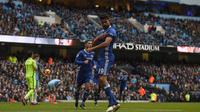 Selebrasi striker Chelsea, Diego Costa, usai membobol gawang Manchester City pada pertandingan lanjutan Premier League, di Etihad Stadium, Sabtu (3/12/2016). (AFP/Paul Ellis). 