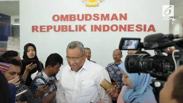 Pengacara David Tobing melaporkan Bank Indonesia ke Ombudsman RI.