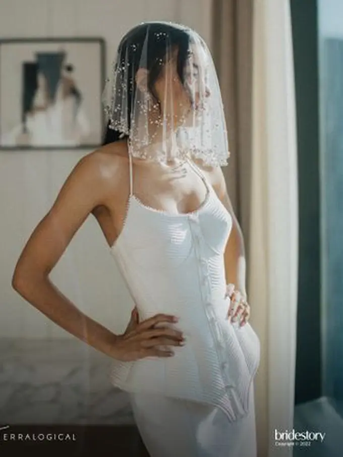 Gaun pernikahan Eva Celia