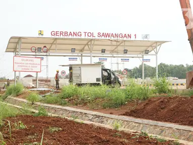 Suasana pembangunan proyek ruas tol Depok-Antasari untuk seksi II yang menghubungkan Jalan Brigif-Sawangan di kawasan Depok, Jawa Barat, Selasa (11/2/2020). Proyek sepanjang 6,3km tersebut ditargetkan beroperasi pada triwulan I-2020. (Liputan6.com/Immanuel Antonius)