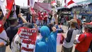 Anggota Disabilitas Indonesia Pospera Tuna Rungu Indonesia mendeklarasikan dukungan terhadap Joko Widodo (Jokowi) di Jakarta, Minggu (19/8). Mereka berharap Jokowi kembali terpilih kembali menjadi Presiden RI. (Liputan6.com/Herman Zakharia)