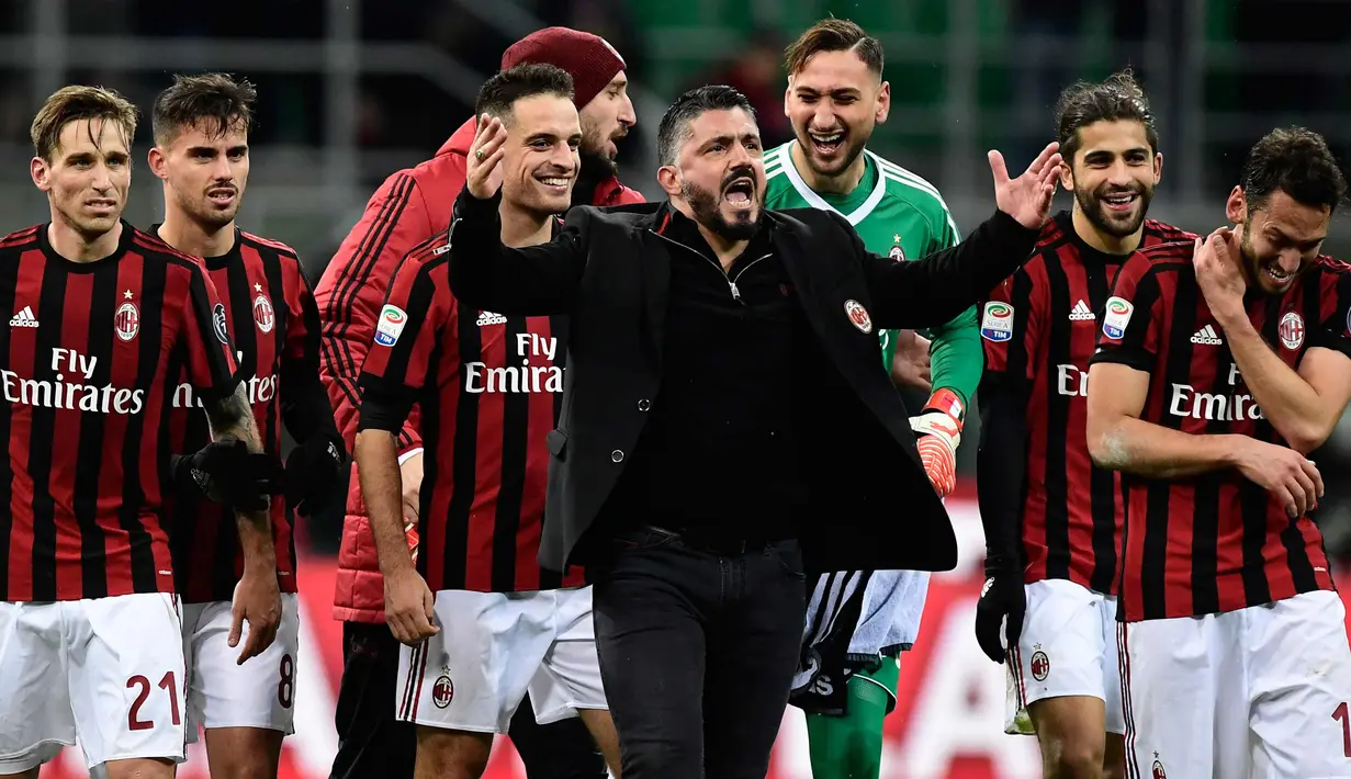 Pelatih AC Milan, Gennaro Gattuso merayakan kemenangan usai mengalahkan Sampdoria 1-0 pada lanjutan Liga Serie A Italia di stadion San Siro (18/2). Il Diavolo Rosso belum terkalahkan dalam 10 laga terakhir di berbagai ajang. (AFP Photo/Miguel Medina)
