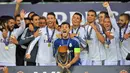 Gelar ketiga adalah trofi Piala Super Eropa. Real Madrid berhasil menang 2-0 atas Sevilla dalam laga yang digelar di Cardiff Stadium, 12 Agustus 2014. (AFP/Glyn Kirk)