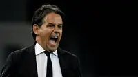 Pelatih Inter Milan, Simone Inzaghi saat laga Liga Italia 2023/2024 melawan Udinese di Friuli - Dacia Arena stadium, Udinese, Italia, Selasa (09/04/2024) WIB. (AFP/Filippo Monteforte)