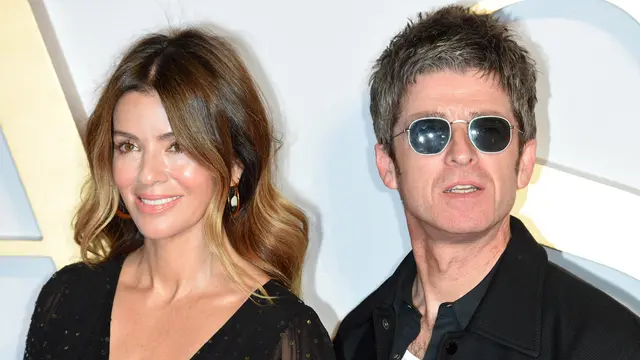 Noel Gallagher dan Sara MacDonald . (Anthony Harvey/AFP)