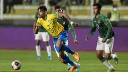 Brasil mampu mendominasi jalannya laga. Tim tamu memiliki penguasaan bola mencapai 56 persen berbanding 44 persen milik Bolivia. (AP/Juan Karita)