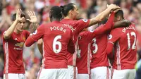 Sempat kalah dalam dua laga terakhir Premier League, akhirnya Manchester United bangkit dan meraih kemenangan 4-1 dari sang juara bertahan, Leicester. Tiga poin ini mengantar Setan Merah naik ke posisi enam klasemen sementara. (AFP/Anthony Devlin)