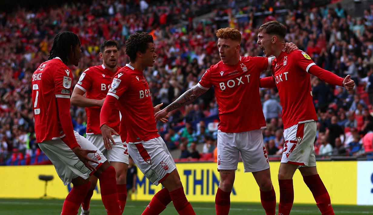 Sebagai tim promosi Liga Inggris pada musim ini, Nottingham Forest melakukan perbaikan di tubuh skuatnya. Mereka diketahui telah mendatangkan 11 pemain baru. Selain itu, ada pula 4 pemain yang dilepas The Forest pada bursa transfer musim panas 2022 ini. (AFP/Adrian Dennis)