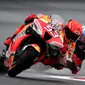 Marc Marquez saat beraksi di MotoGP Portugal (GABRIEL BOUYS / AFP)