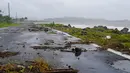 Badai, yang kemudian menguat menjadi badai Kategori 1, tidak sampai ke daratan Puerto Rico, tetapi menjatuhkan sekitar 10 inci hujan di wilayah kota Barranquitas, kata Dinas Cuaca Nasional. (Jaydee Lee SERRANO / AFP)