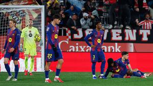 Hasil minor ini tidak hanya menghentikan laju Barcelona, tapi juga menggusur mereka dari puncak klasemen La Liga. (AP Photo/Joan Monfort)