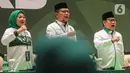 Wakil Ketua Umum PKB bidang Kesra dan Perekonomian Ida Fauziyah (kiri) dan Wakil Ketua Umum PKB bidang Ideologi dan Kaderisasi Hanif Dhakiri terlihat mendampingi Ketua Umum Partai Kebangkitan Bangsa (PKB) Muhaimin Iskandar dalam pembukaan Musyawarah Kerja Nasional (Mukernas) PKB di JCC Senayan, Jakarta, Selasa (23/7/2024). (Liputan6.com/Angga Yuniar)