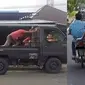 Potret nyeleneh orang bantu dorong kendaraan mogok (sumber: 1cak.com)