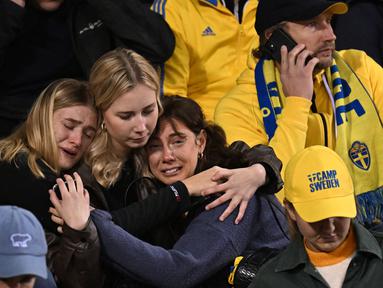 Laga Kualifikasi Euro 2024 antara tuan rumah Timnas Belgia menghadapi Swedia yang berlangsung di King Baudouin Stadium, Brussels, Belgia, Selasa (17/10/2023) dini hari WIB harus dihentikan saat memasuki turun minum dengan kedudukan imbang 1-1 setelah insiden dua warga Swedia yang mengenakan atribut Timnas Swedia dilaporkan tewas tertembak. (AFP/John Thys)