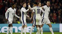 Para pemain Inggris merayakan gol kedua mereka dalam pertandingan kualifikasi Piala Dunia FIFA 2026 zona Eropa antara Albania dan Inggris di stadion "Air Albania" di Tirana,&nbsp;Senin (17-11-2025) dini hari WIB.&nbsp;(Adnan Beci/AFP)
