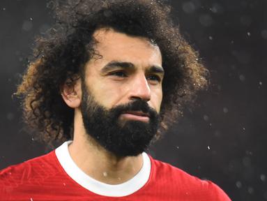 Ekspresi pemain Liverpool, Mohamed Salah saat laga lanjutan Liga Inggris 2023/2024 melawan Newcastle di Anfield, Liverpool, Inggris, Selasa (02/01/2023) dini hari WIB. (AFP/Peter Powell)