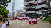 Anak Kembali Sekolah di Puncak Musim Hujan, IDAI Beri 5 Kiat Jaga Si Kecil Tetap Sehat