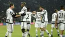 Para Pemain Juventus merayakan gol  Mario Mandzukic (kiri)pada lanjutan liga Champion grup D antara Juventus vs Manchester City di Stadion Juventus, Kamis (26/11/2015) dini hari WIB.  (AFP Photo/Olivier)