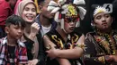 Atiqoh tampak berbaju hitam dengan kerudung berwarna krem. (Liputan6.com/Herman Zakharia)