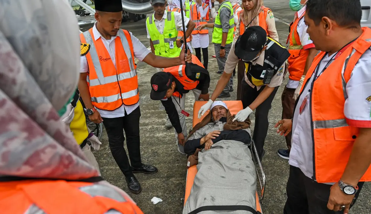 Jemaah haji Aceh kloter terakhir ini berasal dari Banda Aceh, Aceh Besar, Pidie, Pidie Jaya, Bireuen, Aceh Utara, Lhokseumawe, Aceh Timur, Langsa, Aceh Tamiang, Aceh Tengah, Bener Meriah, Aceh Barat, Nagan Raya, Simeulue, Aceh Barat Daya, Aceh Selatan, Aceh Singkil, dan Subulussalam. (Chaideer MAHYUDDIN/AFP)