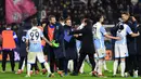 Para pemain SPAL merayakan keberhasilan menahan imbang Juventus pada laga Serie A Italia di Stadion Paolo Mazza, Ferrara, Sabtu (17/3/2018). SPAL bermain imbang 0-0 dengan Juventus. (AFP/Miguel Medina)