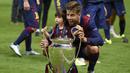 Gerard Pique. Bek tengah asal Spanyol yang kini memasuki musim ke-14 bersama Barcelona ini total meraih 4 trofi Liga Champions. Satu trofi diraihnya bersama Manchester United musim 2007/2008 serta 3 trofi bersama Barcelona, musim 2008/2009, 2010/2011 dan 2014/2015. (AFP/Lluis Gene)