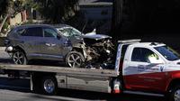 Pegolf 45 tahun itu langsung dibawa ke Harbour UCLA Medical Center guna mendapatkan tindakan perawatan. Akibat kecelakaan tersebut, Tiger Woods diklaim mengalami patah kaki dan harus menjalani operasi. (Foto: AP/Ashley Landis)