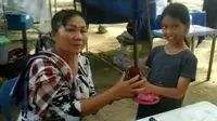 Bocah 9 Tahun Kembalikan Tas Berisi Uang dan Emas 90 Gram