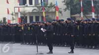 Sejumlah personel Brimob saat mengikuti apel Korps Brimob Polri di Kelapa Dua, Depok, Jumat (11/11). Dalam apel tersebut, Presiden Jokowi memberikan pengarahan sebagai Inspektur Upacara. (Liputan6.com/Immanuel Antonius)