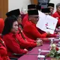 DPP Partai Demokrasi Indonesia Perjuangan (PDIP) mendaftarkan bakal calon legislatif (bacaleg) ke Komisi Pemilihan Umum (KPU), Jakarta, Kamis (11/5/2023). (Liputan6.com/Herman Zakharia)