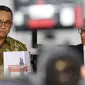 Gubernur dan Wakil Gubernur terpilih DKI Jakarta, Anies Baswedan dan Sandiaga Uno menghadiri penyerahan laporan hasil kerja tim sinkronisasi di Jakarta, Jumat (13/10). (Liputan6.com/Immanuel Antonius)