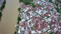Luapan sungai Bone menerjang Kelurahan Bugis dan Talumolo Kota Gorontalo (Arfandi Ibrahim/Liputan6.com)