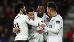 Pemain Liverpool merayakan gol Philippe Coutinho ke gawang AFC Bournemouth pada pekan 18 Premier League di Vitality Stadium, Minggu (17/12). Liverpool mencukur tuan rumah AFC Bournemouth empat gol tanpa balas. (Andrew Matthews/PA via AP)