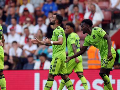 Manchester United kembali berhasil meraih tiga poin saat bertandang ke markas Southampton dalam pertandingan pekan ke-4 Premier League 2022/2023 yang berlangsung di St Mary's Stadium, Sabtu (27/8/2022). (AFP/Adrian Dennis)