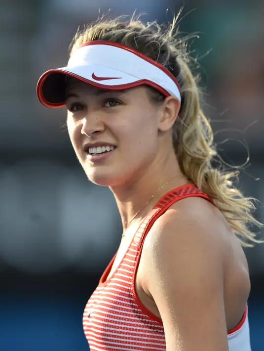 Eugenie Bouchard dinobatkan beberapa situs olahraga dan tenis sebagai salah satu petenis tercantik di dunia pada 2015. Genie adalah petenis putri Kanada pertama yang berhasil menembus final kejuaraan Grand Slam kelas tunggal. (PETER PARKS/AFP)