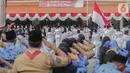 Peserta upacara memberikan hormat kepada bendera merah putih saat upacara peringatan Hari Sumpah Pemuda di Museum Sumpah Pemuda, Jakarta, Senin (28/10/2019). Upacara yang diikuti sejumlah pelajar ini diselenggarakan dalam rangka memperingati Hari Sumpah Pemuda ke-91. (liputan6.com/Faizal Fanani)