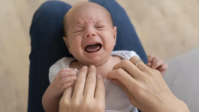 Cara Mengatasi Gumoh Pada Bayi